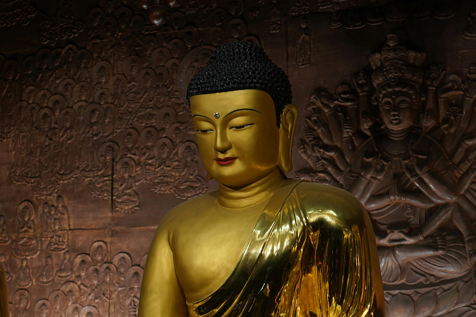 golden buddha statue in seoul temple